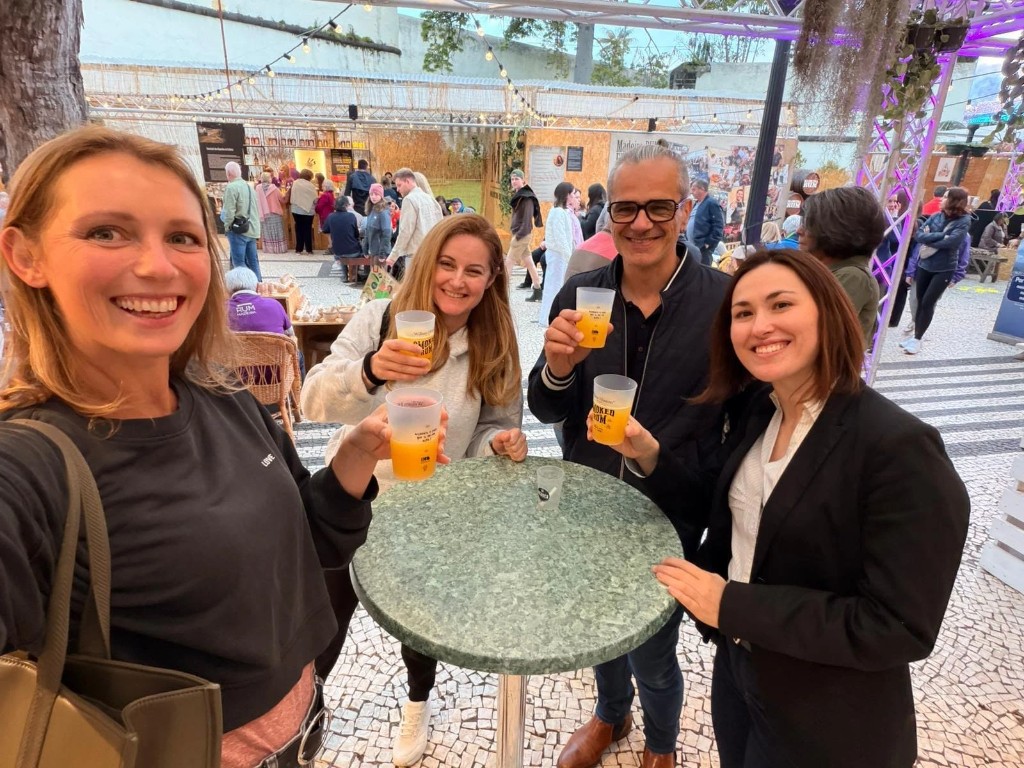 Madeira Friends group enjoying poncha at a Funchal festival
