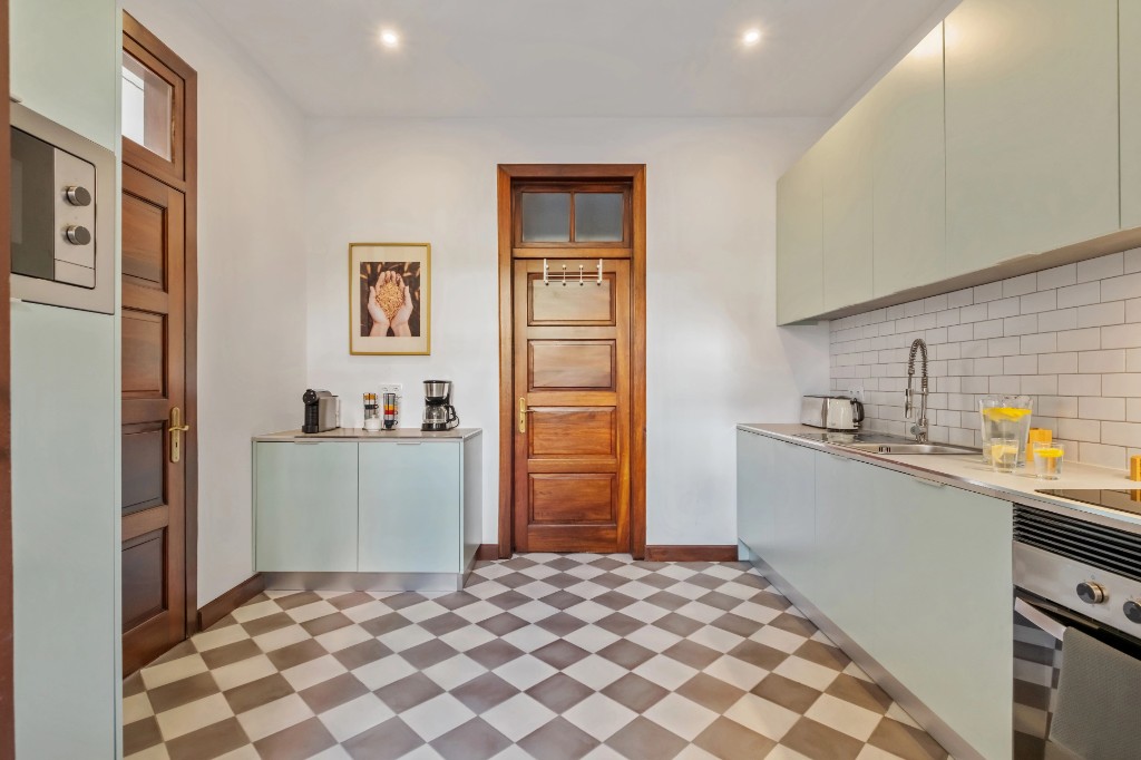 Shared kitchen at Casa de Pico coliving in Funchal